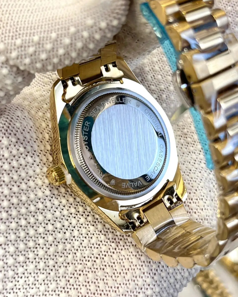 Role_x Sky-Dweller gold tifni
